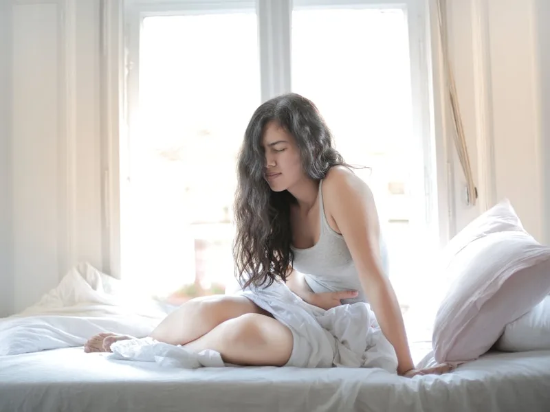 Pharmacist assessing UTI symptoms